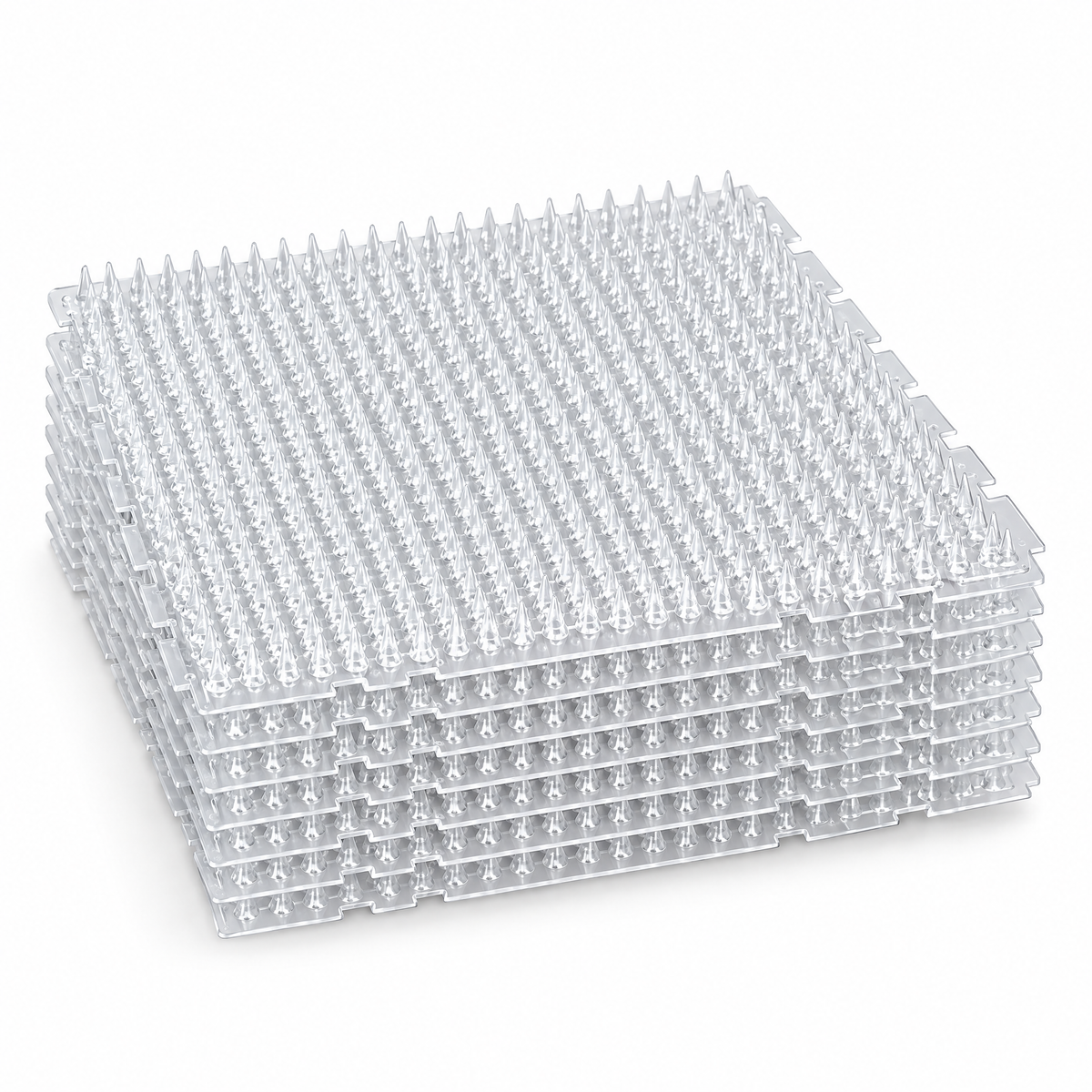 Stack of clear Tree Halo sheets with rows of small plastic spikes